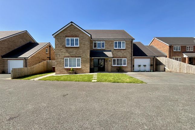 4 bed detached house