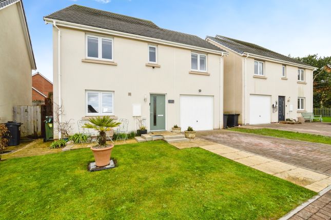 4 bed detached house