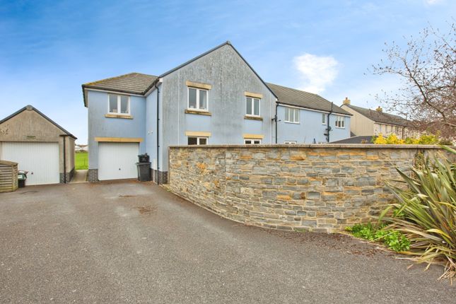 4 bed detached house