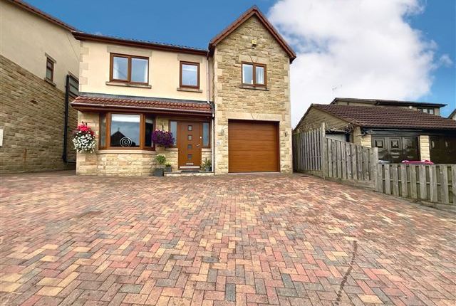 4 bed detached house