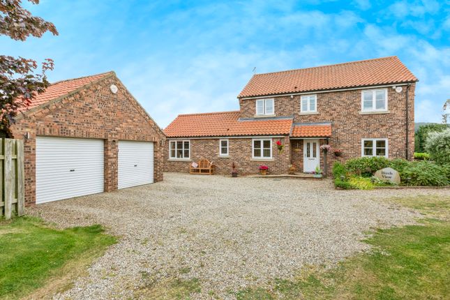 4 bed detached house