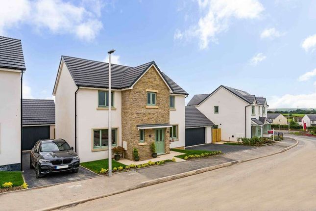 4 bed detached house