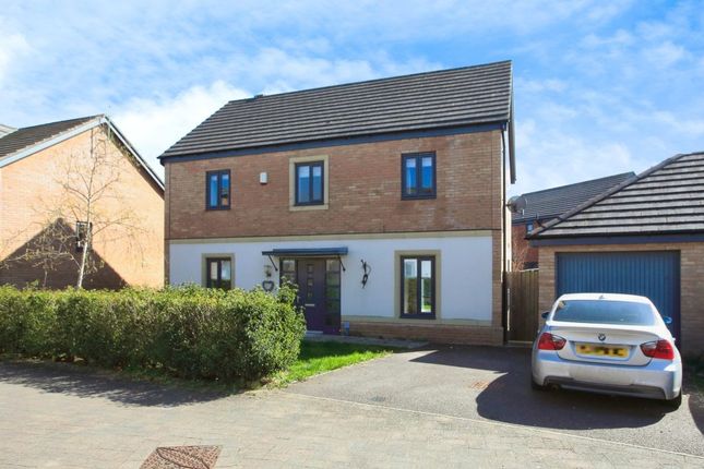 4 bed detached house