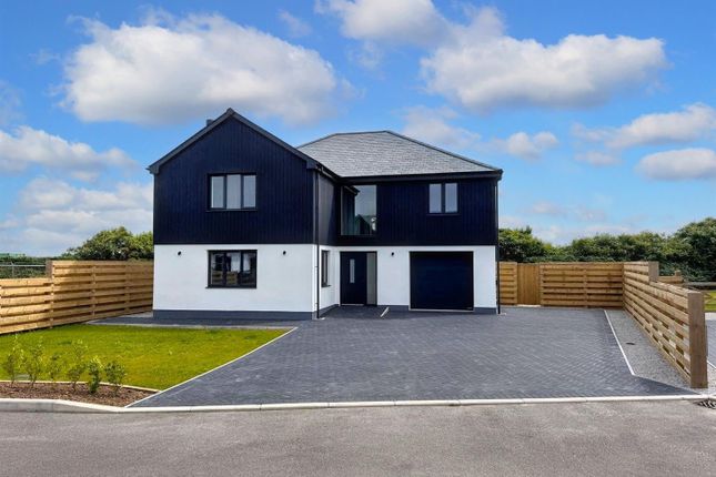 4 bed detached house