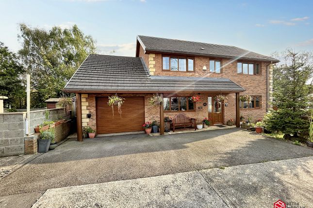 4 bed detached house