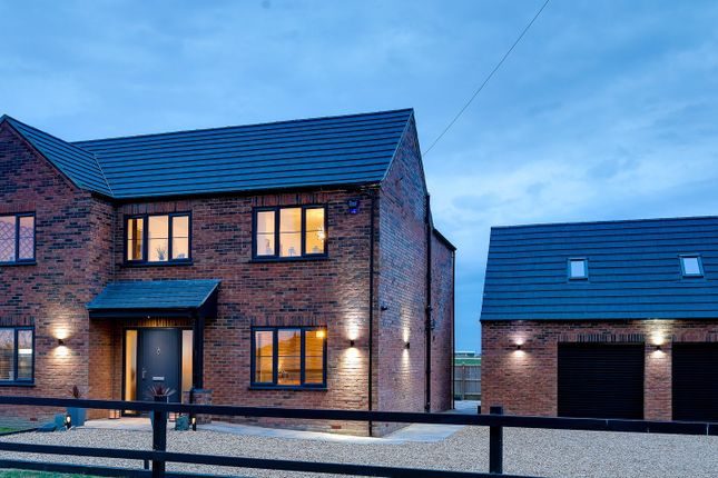 4 bed detached house