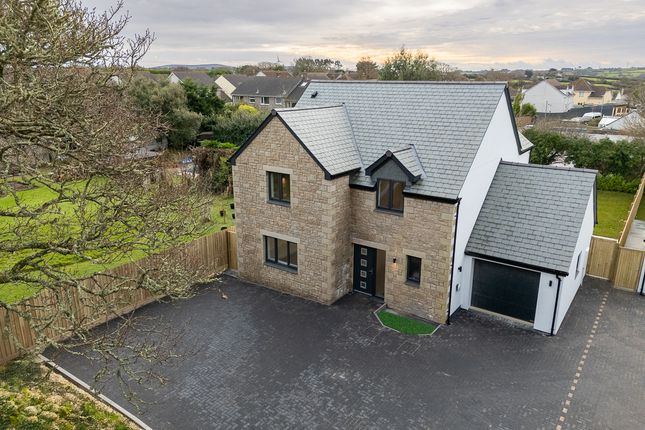 4 bed detached house