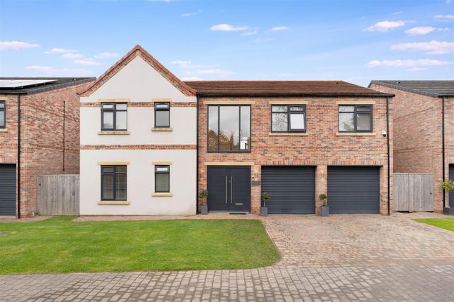 4 bed detached house