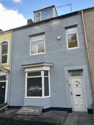 4 bed terraced house