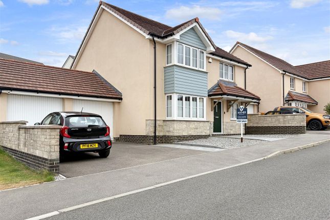 4 bed detached house