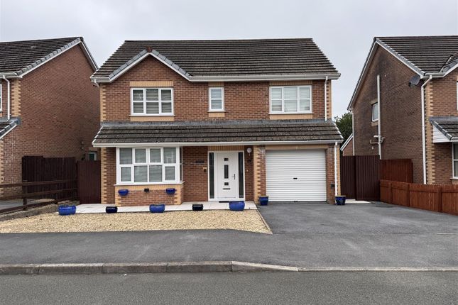 4 bed detached house