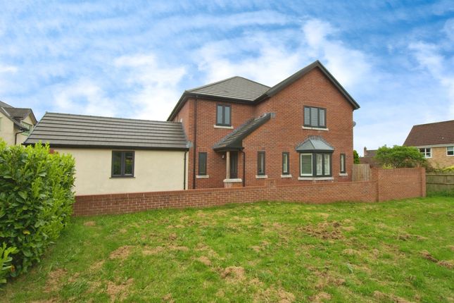 4 bed detached house