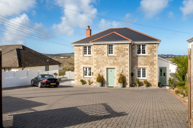 4 bed detached house