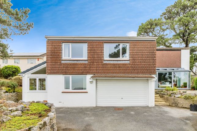 4 bed detached house