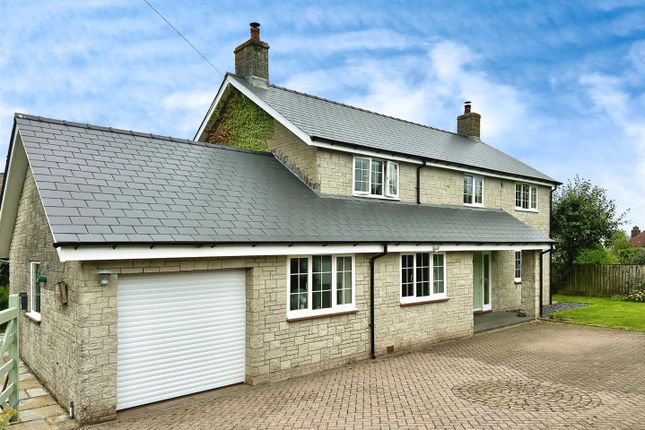 4 bed detached house