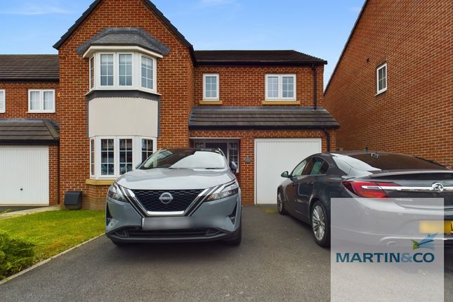 4 bed detached house