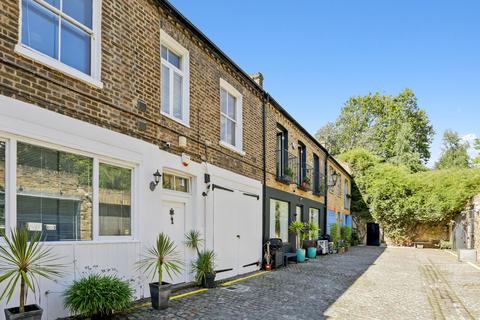Russell Gardens Mews, London 4 bed mews for sale