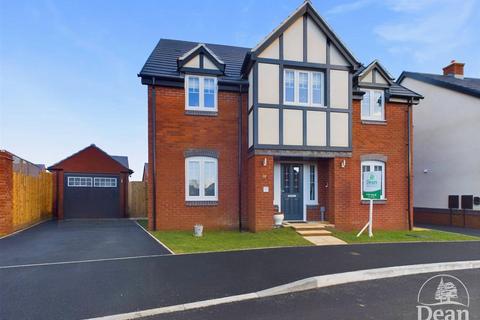 4 bed detached house