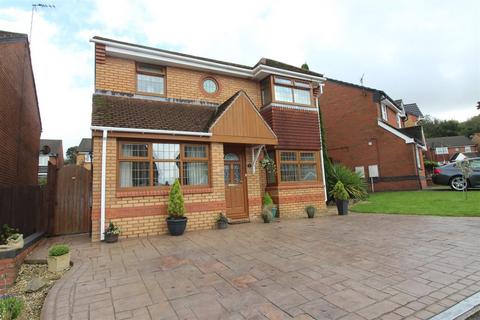 4 bed detached house