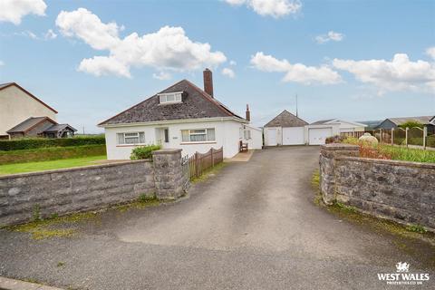 Login 4 bed detached bungalow for sale