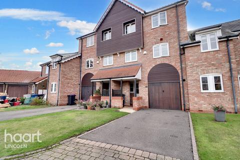 The Moorings, Burton Waters 3 bed townhouse for sale