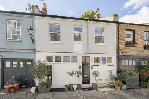 Russell Gardens Mews, London W14 4 bed terraced house for sale