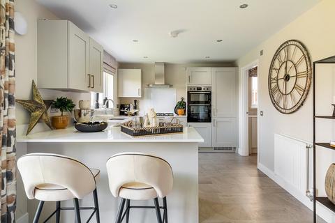 4 bed detached house