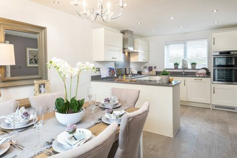 4 bed detached house