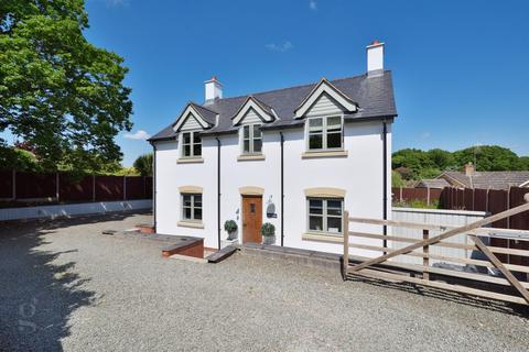 4 bed detached house