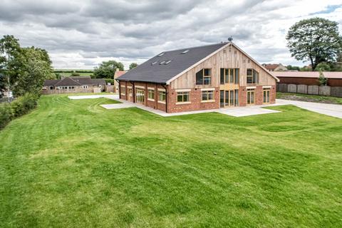 Saxton, Main Street, Tadcaster, LS24 5 bed barn conversion for sale