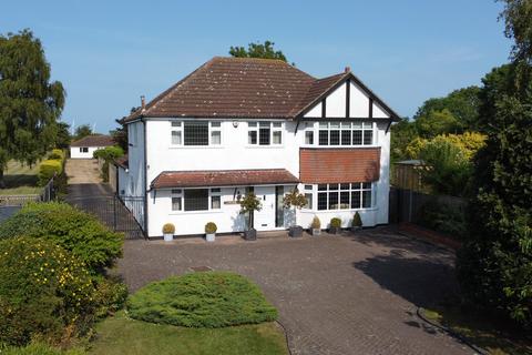 4 bed detached house