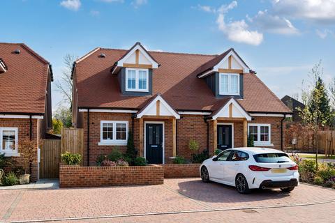 Lambert Close, Effingham... 2 bed semi